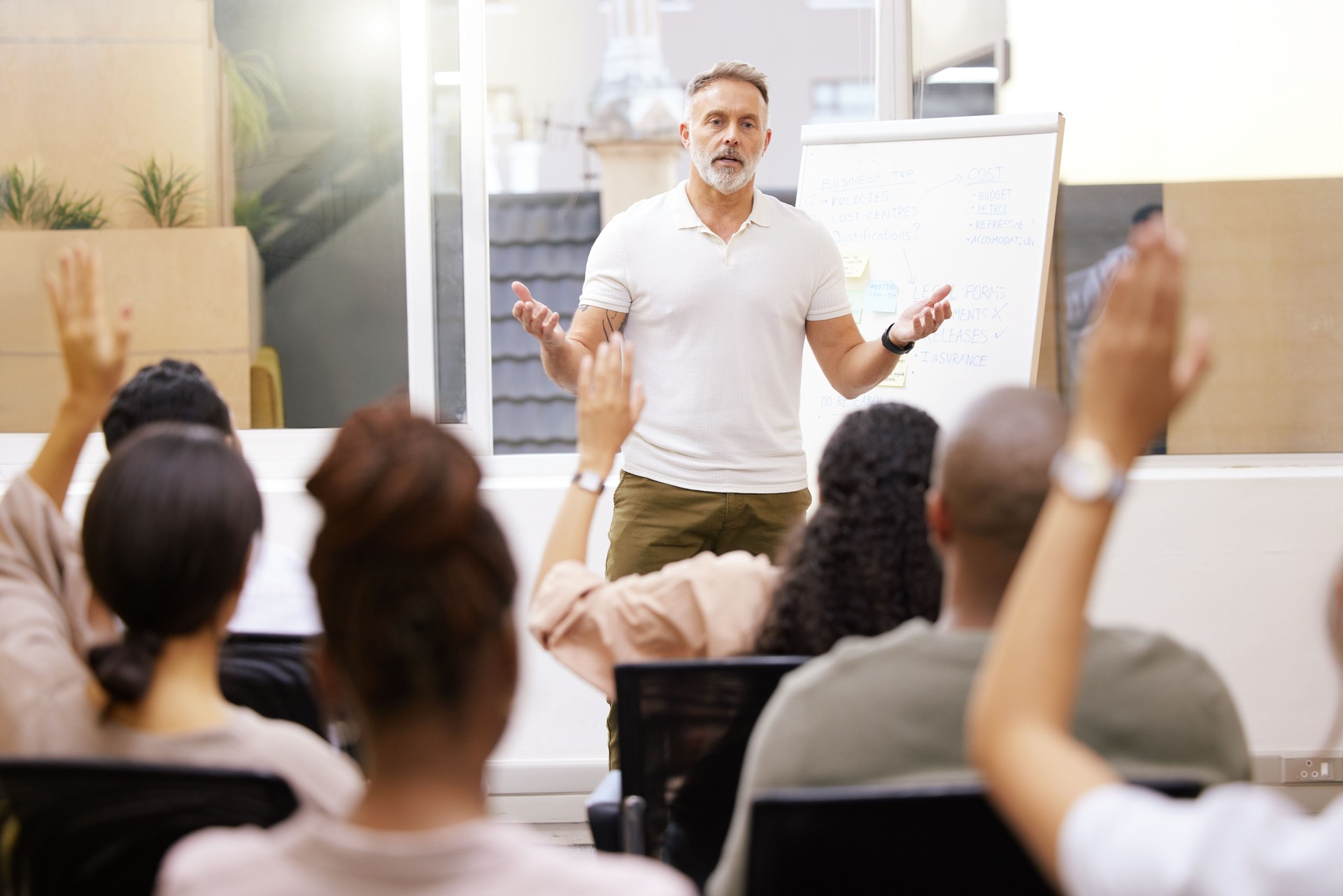 Shot of a handsome mature businessman giving a presentation in the conference room